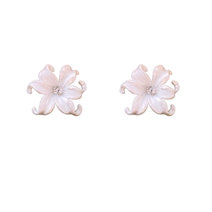 Elegant white acrylic flower earrings with sparkling cubic zirconia centers in a 6-petal design