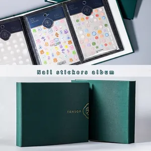 Dark green nail sticker storage album with gold logo and clear display sleeves