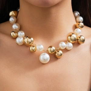 Punk style necklace featuring metallic gold beads and white faux pearls for women
