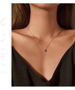 Detail of pink octagon-cut stone necklace in S925 silver with gold plating