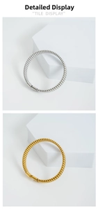 Dettaglio della trama intrecciata dei bracciali in acciaio inossidabile oro e argento