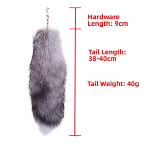 Detail showing 40cm silver fox tail pendant with 9cm golden keychain and size markings