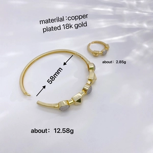 18K gold plated bangle and ring set featuring geometric studs and sparkling zircons