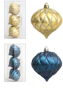 Detail of gold and dark blue onion-shaped Christmas balls with glitter mesh texture