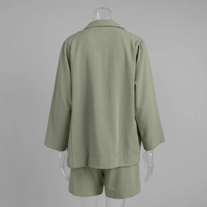 Detailed back view of a bean green cotton linen two-piece set with relaxed fit shorts