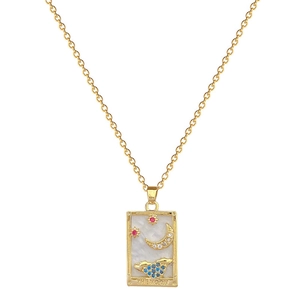 Gold tarot moon necklace with shell base and zircon stars on a delicate steel chain