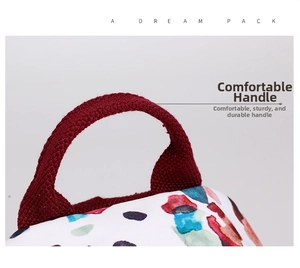 Close-up of red woven handle and watercolor print on a stylish nylon backpack for women