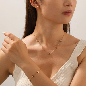 Parure bijoux plaqué or 18k avec collier et boucles d'oreilles cœur en zircon violet