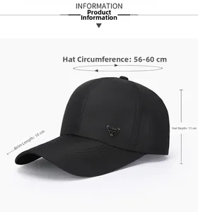 Detail view of black baseball cap with breathable texture and triangle metal logo