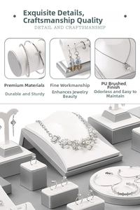 Detail of silver brushed PU leather jewelry display stand set for necklaces and rings