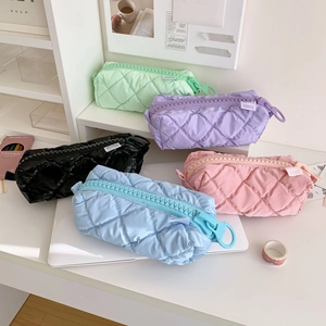 Quilted fluffy stationery pouch with large zipper and soft cloud-like texture in five colors