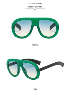 Detailed front and side views of oversized green aviator sunglasses with tea gradient lenses