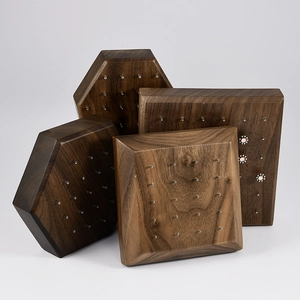 Walnut wood jewelry display stands in square, rectangular, and hexagonal shapes