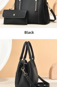 Detail of black lychee texture leather handbag and matching wallet with gold hardware