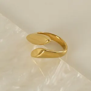 Minimalist 18k gold plated open geometric ring with smooth teardrop ends on stone base
