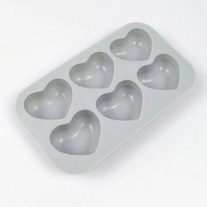 Detailed view of the flexible 6-cavity heart-shaped silicone mold for chocolate baking
