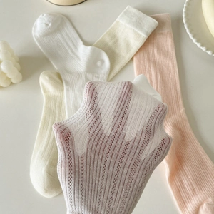 Breathable hollow knit socks for women in soft pastel colors with a sheer mesh texture
