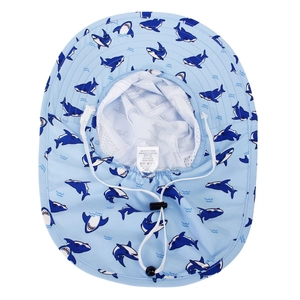 Detail of shark print sun hat showing breathable mesh lining and washing label details
