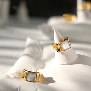 18K gold-plated titanium ring with square mother of pearl and wave texture details