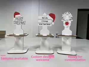 Three-piece wooden Christmas mini wine bottle holders with Santa hat and reindeer motifs