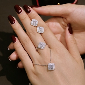 925 silver jewelry set with square pink zircon necklace, earrings, and ring on model