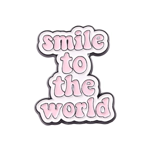 Set de pin's en émail avec lettrage rose 'smile to the world' et support métallique