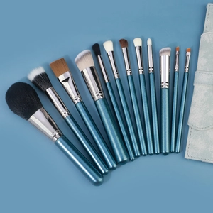 Set professionale di 13 pennelli trucco blu glitterati con custodia coordinata
