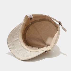 Detail of cotton polyester cadet cap showing breathable metal eyelets and inner sweatband
