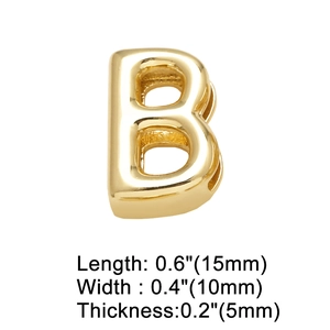 Detailed view of golden letter B pendant with high-polish finish and 3D metal texture