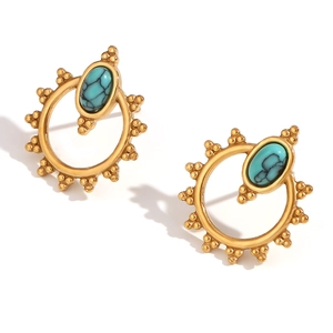 Bohemian gold plated flower rim stud earrings featuring oval turquoise inlay