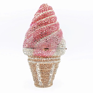 Close-up of sparkling pink and white crystals on ice cream shaped luxury clutch