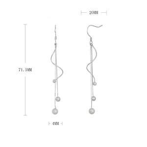 Detail view of long silver tassel earrings with 71.5mm height and frosted bead design