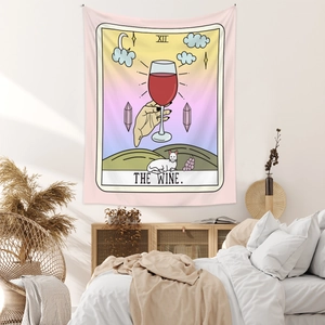 Detailed view of bohemian tarot tapestry featuring The Wine design and white cat on wall