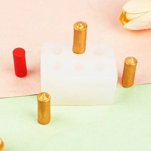 Detailed view of white 6-cavity silicone mold for DIY cylindrical candles and soaps