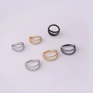 Three-row cubic zirconia seamless hinged rings in silver, gold, and black stainless steel
