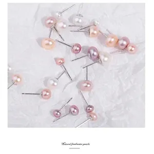 Elegant natural freshwater pearl stud earrings in white, pink, and purple silver settings