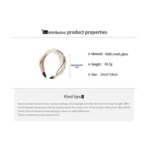 Detail showing fabric mesh braided headband with crystal beads and size specifications