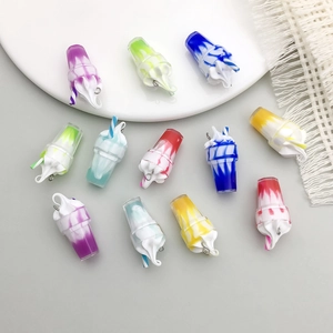 Detailed view of colorful resin ice cream drink pendants for DIY jewelry making