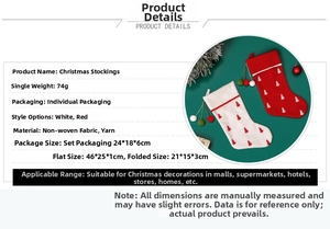 Detail view of red and white knitted Christmas stockings with 3D pom-poms and tree patterns