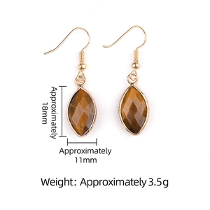 Faceted marquise-cut brown gemstone earrings with gold hooks on a white background