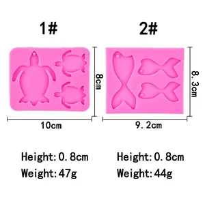 Pink silicone mold with turtle and fish designs for DIY resin or chocolate crafts