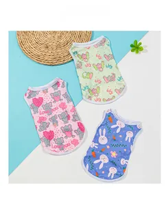 Three cotton puppy vests featuring pink elephant, green elephant, and blue rabbit prints