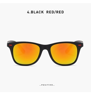 Front view of black matte sports sunglasses with vibrant orange-red mirrored lenses