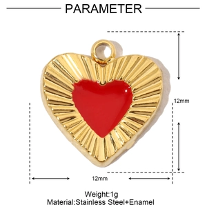 Macro detail of red enamel heart pendant in gold stainless steel with size and weight specs
