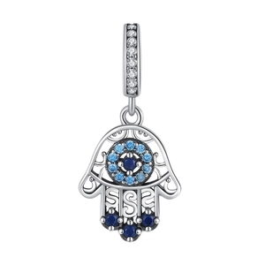 Macro shot of silver Hamsa charm with blue crystals and paved rhinestones for bracelets