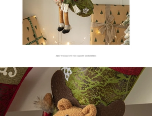 Close-up of a plush reindeer Christmas stocking with festive holiday decorations