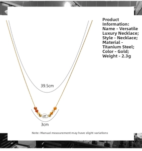 Detail of 18K gold-plated titanium steel necklace with natural stones and white pearl