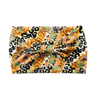 Yellow paisley and leopard print yoga headband with bow tie for women sports