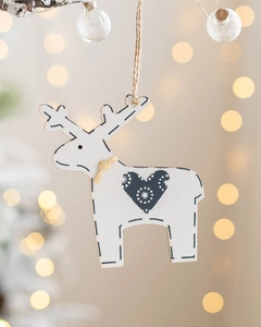 Macro view of white wooden reindeer Christmas ornament with heart pattern and jute rope