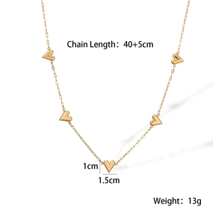 Detail view of gold heart pendant necklace showing chain length 40+5cm and weight 13g